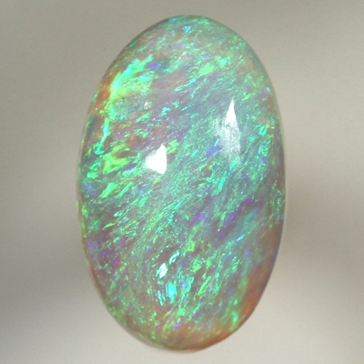 SOLID CRYSTAL OPAL Bright green fire in a 3 dimensional pattern